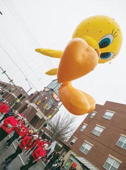 Marchers guide the gigantic Tweety Bird balloon, sponsored by Martin’s Food Markets, down Broad Street at the Christmas Parade on Dec. 6th.