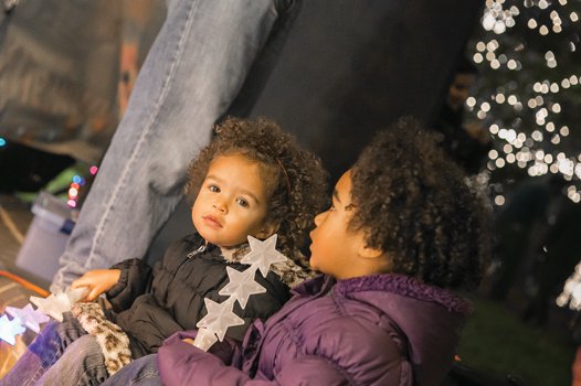 Two-year-old Olivia Cheek, left, and Aliyah Cheek, 5, are dazzled by the lights at the James Center Downtown during the 30th annual Grand Illumination last Friday.