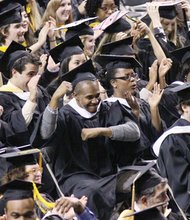 Virginia Commonwealth University students celebrate during the fall commencement ceremonies Saturday at the Siegel Center.