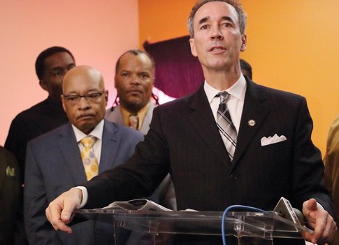 Delegate Joe Morrissey of Henrico County addresses the congregation Sunday at New Kingdom Christian Ministries in Highland Park as the church’s pastor, the Rev. Leonidas Young II, left, listens. Rev. Young, a former Richmond mayor, served time in prison after being convicted in 1999 of fraud and influence peddling.