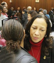 Judge Birdie Hairston Jamison gets hugs from well-wishers following her appearance before the judicial selection committees last Friday.
