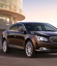 2015 Buick LaCrosse front view with Midnight Amethyst exterior Metallic exterior color and 20-inch premium painted Alloy wheels. Courtesy of General Motors. 