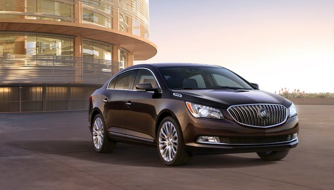 2015 Buick LaCrosse front view with Midnight Amethyst exterior Metallic exterior color and 20-inch premium painted Alloy wheels. Courtesy of General Motors. 