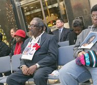 John Burnley, left, lost his daughter, Juanita Burnley, to homicide in 2007. Mr. Burnley attended the memorial with his grandson, Quinton Washington, right, Ms. Burnley’s son.