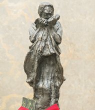 Donald Earley sculpted the “River of Tears” memorial statue in 1996 on behalf of the Coalition Against Urban Violence led by Linda Jordan, who lost her son to violence six years earlier. The statue, a permanent memorial to victims of violence, is installed at City Hall in Downtown and is a centerpiece of the annual remembrance vigil the coalition holds for families of victims. Mr. Earley, an artist and assistant professor at Virginia Commonwealth University’s Qatar campus, lost a nephew, Noel, to violence in 1999 in Richmond.