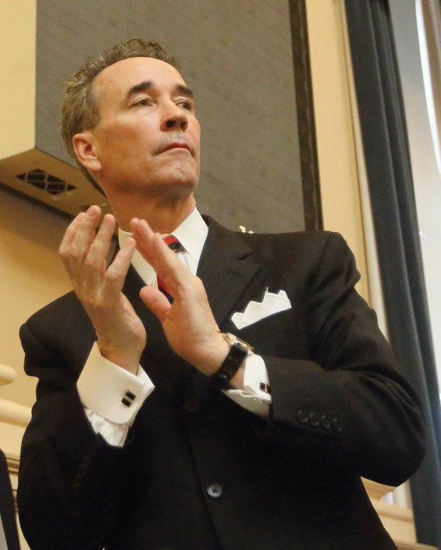 Henrico Delegate Joseph D. "Joe" Morrissey joins in applauding visitors Wednesday to the General Assembly. He is facing potential sanctions from his colleagues in the House as the result of his conviction last month of contributing to the delinquency of a minor.