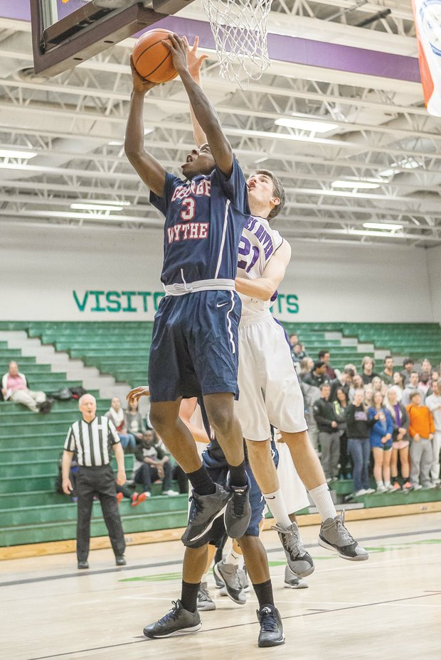 Maliek White goes up to score against James River High School. His talent on the court is attracting scholarship offers from colleges across the nation.