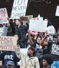 Hundreds of demonstrators rally on the steps of the John Marshall Courthouse in Downtown Richmond in late November after a grand jury in Ferguson, Mo., failed to indict white police officer Darren Wilson in the August slaying of unarmed teenager Michael Brown Jr.