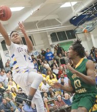 Senior Daniel Saunders, Hopewell High’s top scorer, leaps for two more points in leading the Blue Devils to a 61-55 victory over visiting Prince George High last Friday. This was Hopewell’s third win over Prince George this season and extended the Blue Devils’ winning streak to 16.