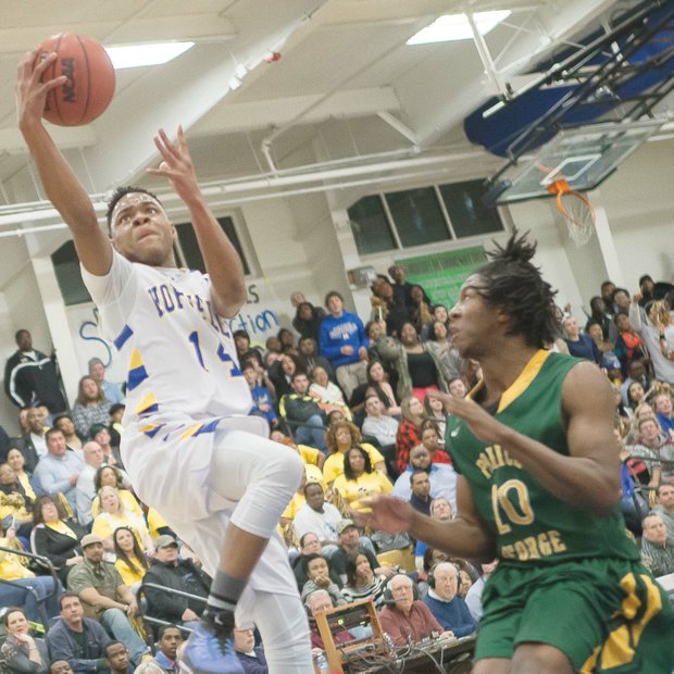 Senior Daniel Saunders, Hopewell High’s top scorer, leaps for two more points in leading the Blue Devils to a 61-55 victory over visiting Prince George High last Friday. This was Hopewell’s third win over Prince George this season and extended the Blue Devils’ winning streak to 16.