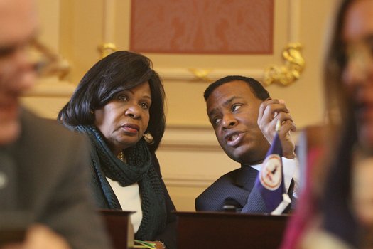 Virginia State Senators Rosalyn R. Dance of the 16th District (Petersburg) and Kenneth C. Alexander of the 5th District (Norfolk) chat in the Senate Chamber before the opening of the 2015 session of the General Assembly on Jan. 14, 2015. 