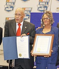 Wendell Scott’s children bask in the glory of their father’s posthumous induction into the NASCAR Hall of Fame during a ceremony Jan. 31 in Charlotte, N.C. They are, from left, Sybil Scott, Wendell Scott Jr., Deborah Davis and Franklin Scott.