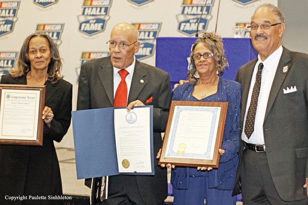 Wendell Scott’s children bask in the glory of their father’s posthumous induction into the NASCAR Hall of Fame during a ceremony Jan. 31 in Charlotte, N.C. They are, from left, Sybil Scott, Wendell Scott Jr., Deborah Davis and Franklin Scott.