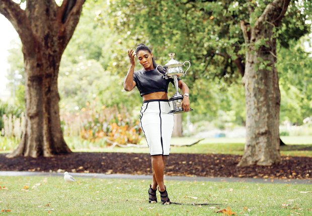 Serena Williams shows off the Daphne Akhurst Memorial Cup on Sunday, a day after winning the women’s singles title in the 2015 Australian Open. The photo session took place at the Royal Exhibition Building in Melbourne.