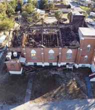 The shell of the burned out New Salem Missionary Baptist Church in Tampa, Fla., remains standing after being heavily damaged by an early morning fire Feb. 2. The church, led by Dr. Henry J. Lyons, has faced recent financial difficulty.