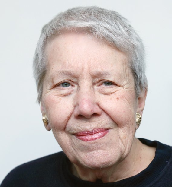 Mary Alice Nesbitt purposefully walks from the kitchen to the fellowship hall, then back to the kitchen at Centenary United ...