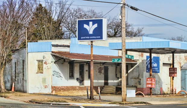 Bon Secours’ blue banner promises “good help coming soon” in the form of a new wellness center at the site of a former gas station and car wash at 2600 Nine Mile Road in Church Hill.