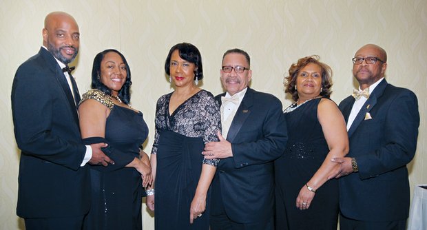 chapter leaders, from left, include Jeffrey Jackson, chapter president, with Madeline Berry; Alan J. Foster, ball committee co-chair, with Rita G. Foster; and Sylvester M. Brown, ball committee co-chair, with Anita M. Brown. The event included dinner, entertainment and dancing. Proceeds from the black-tie affair will go to the Beta Gamma Lambda Education Foundation for scholarships and community outreach programs.