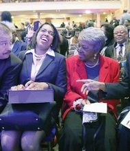 Former Richmond City Council colleagues who brought black political power to City Hall in 1977 take part in a recognition ceremony that Mayor Dwight C. Jones hosted Wednesday night at The Hippodrome Theater in Jackson Ward. Right, Henry W. “Chuck” Richardson chats with Claudine McDaniel, who stood in for her mother, the late Claudette Black McDaniel, Willie J. Dell and Henry L. Marsh III, who became the city’s first African-American mayor with the votes of his colleagues. 