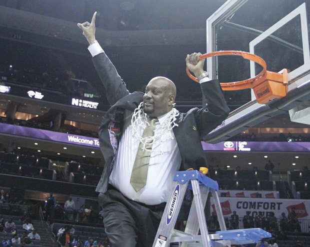 VSU women’s basketball coach James Hill Jr. exuberantly signals his team is No. 1.