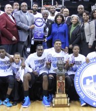 Livingstone College’s men’s basketball team and other supporters celebrate after the Blue Bears outran Winston-Salem State University’s Rams in a 106-91 barn burner in last Saturday’s CIAA title game at Time Warner Cable Arena in Charlotte, N.C.