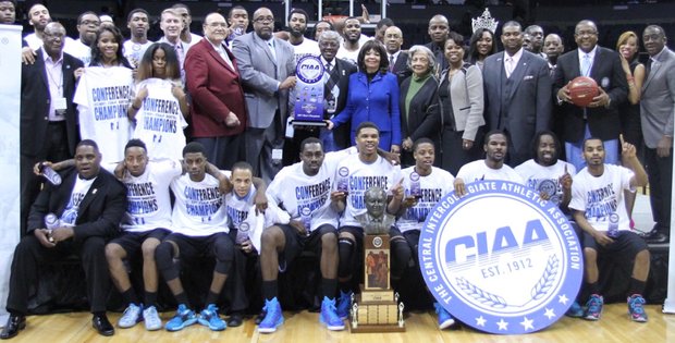 Livingstone College’s men’s basketball team and other supporters celebrate after the Blue Bears outran Winston-Salem State University’s Rams in a 106-91 barn burner in last Saturday’s CIAA title game at Time Warner Cable Arena in Charlotte, N.C.