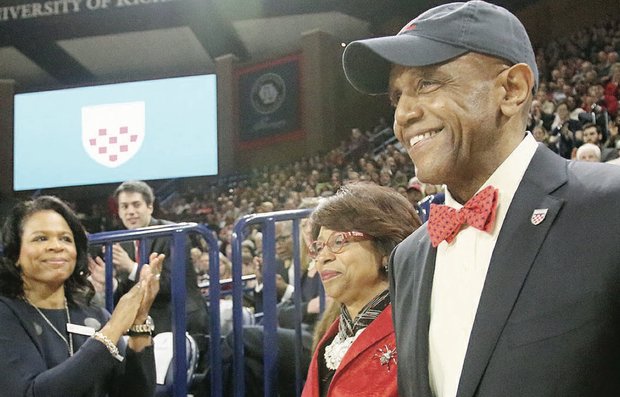 New University of Richmond President Ronald A. Crutcher and his wife, Betty, receive a standing ovation at his welcome ceremony at the Robins Center.