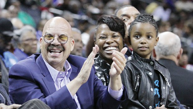 National radio host Tom Joyner takes in a game with CIAA Commissioner Jacquie McWilliams and her daughter, Semone Carpenter, after broadcasting his “Tom Joyner Morning Show” from the CIAA Fan Fest at the nearby Charlotte Convention Center