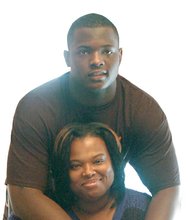Tabyus Taylor embraces his mother, Vannette Taylor, after his ordeal. He and his younger brother, TeAndrey, are trying to get their lives back to normal after the night- mare of arrest and incarceration in Riverside Regional Jail before the charges were dismissed.