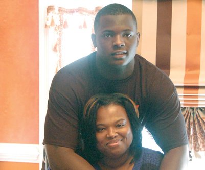 Tabyus Taylor embraces his mother, Vannette Taylor, after his ordeal. He and his younger brother, TeAndrey, are trying to get their lives back to normal after the nightmare of arrest and incarceration in Riverside Regional Jail before the charges were dismissed.