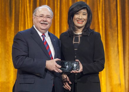 Robert J.Kueppers, Senior Partner, Deloitte LLP and Board Chair, United Way of New YorkCity, with honoree Andrea Jung, President and CEO, Grameen America.