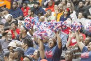 Jubilant fans cheer on the team’s efforts.