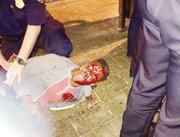 Bloodied University of Virginia student Martese Johnson is held down by an ABC agent after being slammed to the ground last week outside a Charlottesville pub.