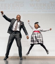 Top This Dad!

Michael Walker and his exuberant, high-flying daughter, Sage, 6, share the stage Sunday at the eighth annual
Date With Dad Dinner and Dance at the Trinity Family Life Center on North Side. The event, organized locally by CAMP DIVA, was part of Date With Dad Weekend 2015, which is intended to draw dads and daughters closer together.