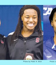 From left, Stanford University teammates Simone Manuel and Lia Neal and University of Florida’s Natalie Hinds share a historic moment at the Women’s Division I NCAA Swimming and Diving Championship in Greensboro, N.C. They became the first African-American swimmers to sweep the 100-yard freestyle event at the national championship event.