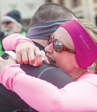 The lovebirds then share a warm embrace.