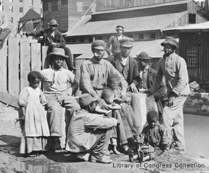 Newly emancipated children and adults at Haxall’s Mill along the Kanawha Canal in Richmond on June 9, 1865.