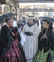 Mabel Gantt, left, Denise Benedetto and Malanna Henderson showcase Civil War-era dress