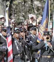 Re-enactors portray U.S. Colored Troops that helped liberate the city on April 3, 1865