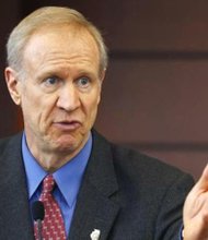 In this March 20, 2015 file photo, Illinois Gov. Bruce Rauner speaks at a news conference in Chicago.