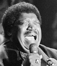 Percy Sledge performs after accepting his award during the Rock and Roll Hall of Fame induction ceremony in 2005 in New York.