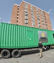 This large generator was set up Tuesday to provide power to residents of the 11-story Fay Towers. The electricity went out Sunday after squirrels damaged a power line leading into the building. 