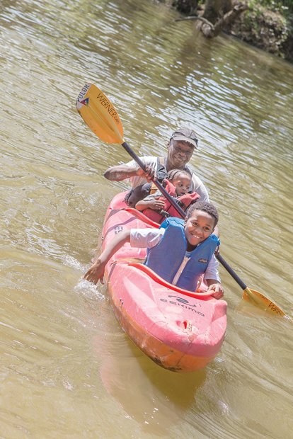 Earth Day fun
Brothers Jamon, 9, and Justin Jones, 2, enjoy
a kayak ride as their grandfather, Wayne Samuels, provides paddle power. The family fun took place last Saturday on
the James River at Great Shiplock Park in Shockoe Bottom during activities
at the city’s annual Earth Day celebration. The actual worldwide Earth Day was April 22 and is designed
to foster environmental protection.