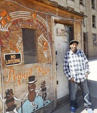 George White, who has operated the newsstand at 47th and Michigan Ave., and is not happy about having to relocate from the spot he’s been in for the last 25 years. He’s being relocated to make way for the Rosenwald redevelopment project. It’s not know yet whether the move will be permanent. 