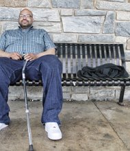 Roderyck Bullock waits patiently for one of GRTC’s CARE vans to take him home from the city’s Social Service Center on South Side. He only wishes, like many riders, that the service he relies on would be more reliable.