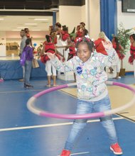 Fitness fun
Six-year-old Alayzin Smith energetically hoops it up during the 4th Annual Health and Wellness Fair at Blackwell Elementary School in the city’s South Side. The school, along with the city’s Department of Parks, Recreation and Community Facilities and the Minority Health Consortium, hosted the spring event to promote community health.