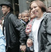 “American Idol” star Rayvon Owen walks through a sea of fans in Downtown with his biggest cheerleader — his mother, Patrice Fitzgerald.