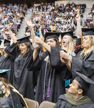 Members of the Virginia Commonwealth University Class of 2015 celebrate with confetti, noisemakers and cheering during Saturday’s commencement at the Richmond Coliseum.