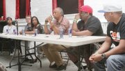 Filmmakers, scholars and music videographers participate in a panel on the history and future of hip-hop through film. They are, from left, visual artist Monsee; Kevin Kosanovich of The College of William & Mary Hip Hop Collection; Zulu Queen Lisa Lee; Emmy Award winner Jesse Vaughan; Virginia State University instructor and visual artist Rob Roby; and Curators of Hip Hop co-founder Jimmie Thomas.