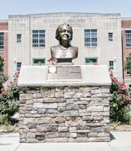 This bust of Richmond’s great lady, Maggie L. Walker, sits on Lombardy Street in front of the regional Governor’s School that bears her name. 
Mrs. Walker, an advocate for civil rights and economic empowerment, is best known for being the first African-American woman to found and become president of a bank. 
The school dedicated the bust last year in celebrating her 150th birthday on July 15. Members of the Maggie L. Walker Class of 2011 led the effort to raise the money for the commemorative bust. 
It is a bronze replica of a plaster bust of Mrs. Walker that sculptor Paul Beneduce created in 1934 for Richmond’s celebration of Maggie L. Walker Month, which took place two months before her death.